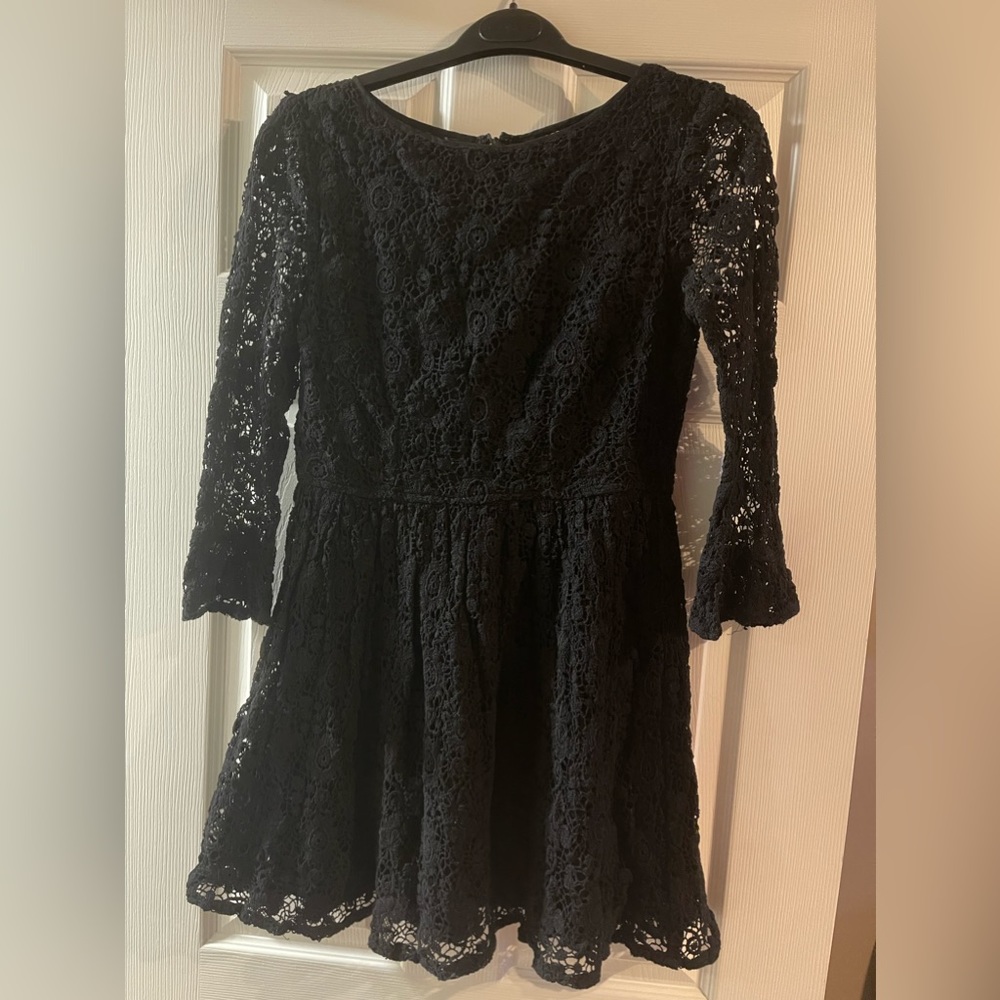 Pretty black flower embroidered Topshop dress Worn 2 times - great condition.